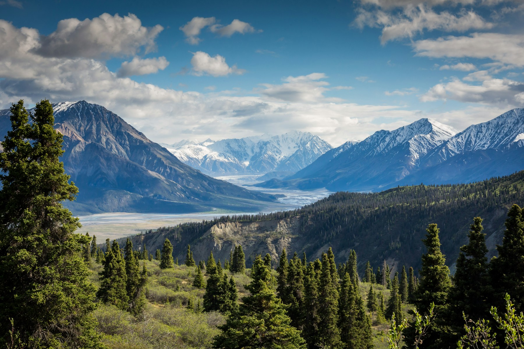 Illustrative mountain landscape with steep rocky peaks